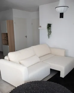 Sovesofa 3 personers VAXHOLM Boucle Cremehvid med opbevaring